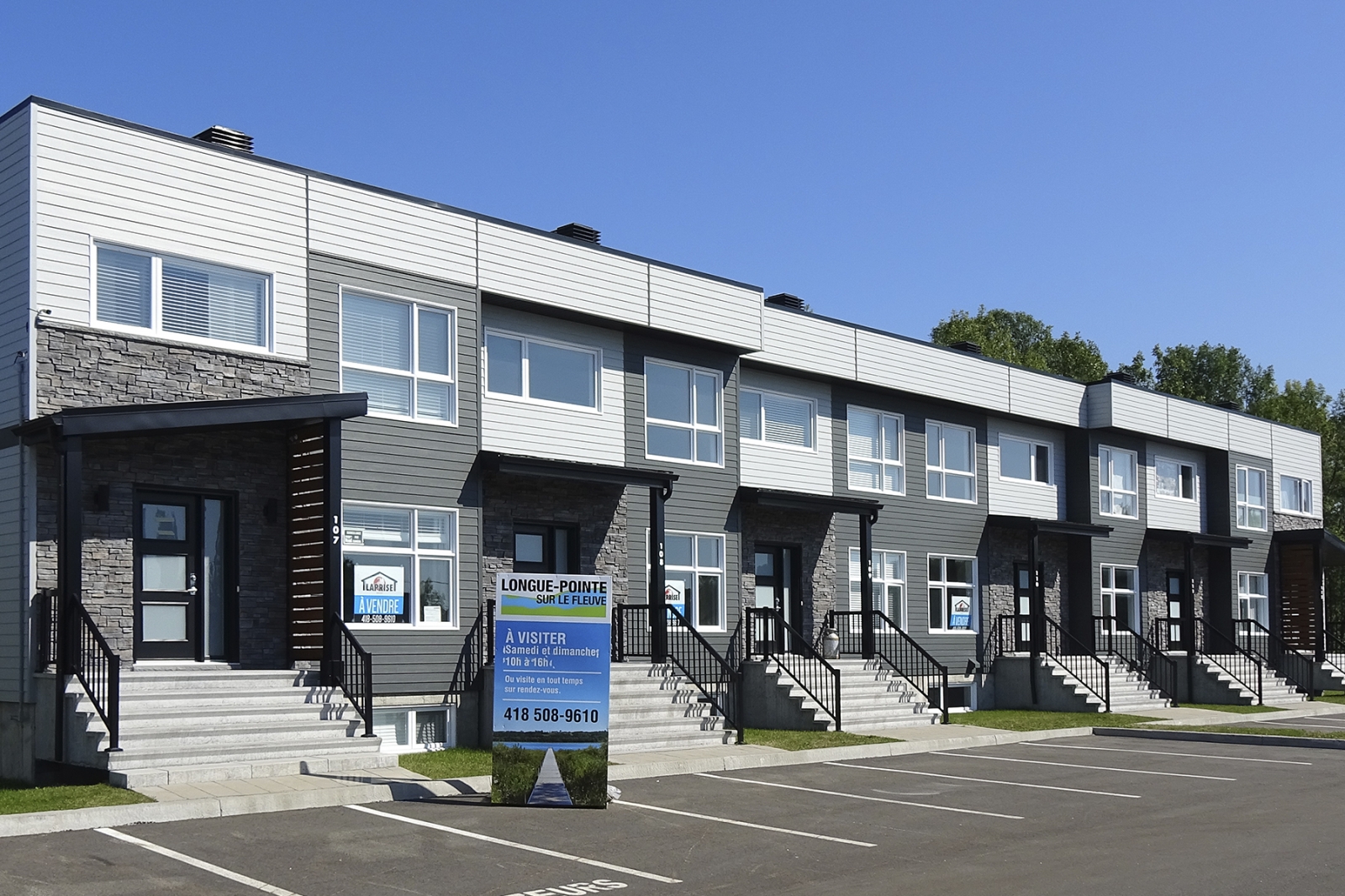 LonguePointe sur le fleuve Maisons à L'AngeGardien
